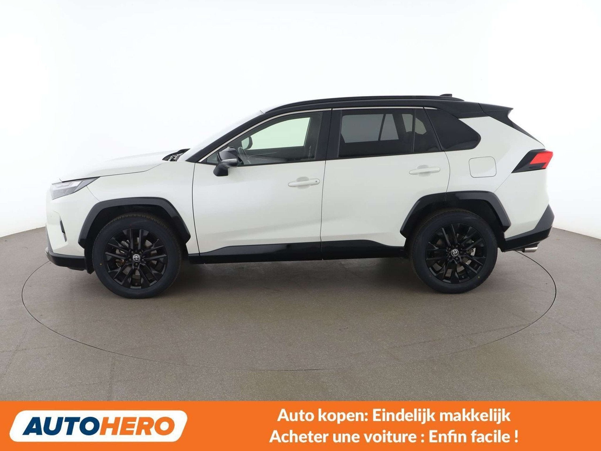 Toyota RAV4 2.5 Hybrid 4x2 Style Selection (bj 2022), Auto's, Gebruikt, 2487 cc, Wit, Leder