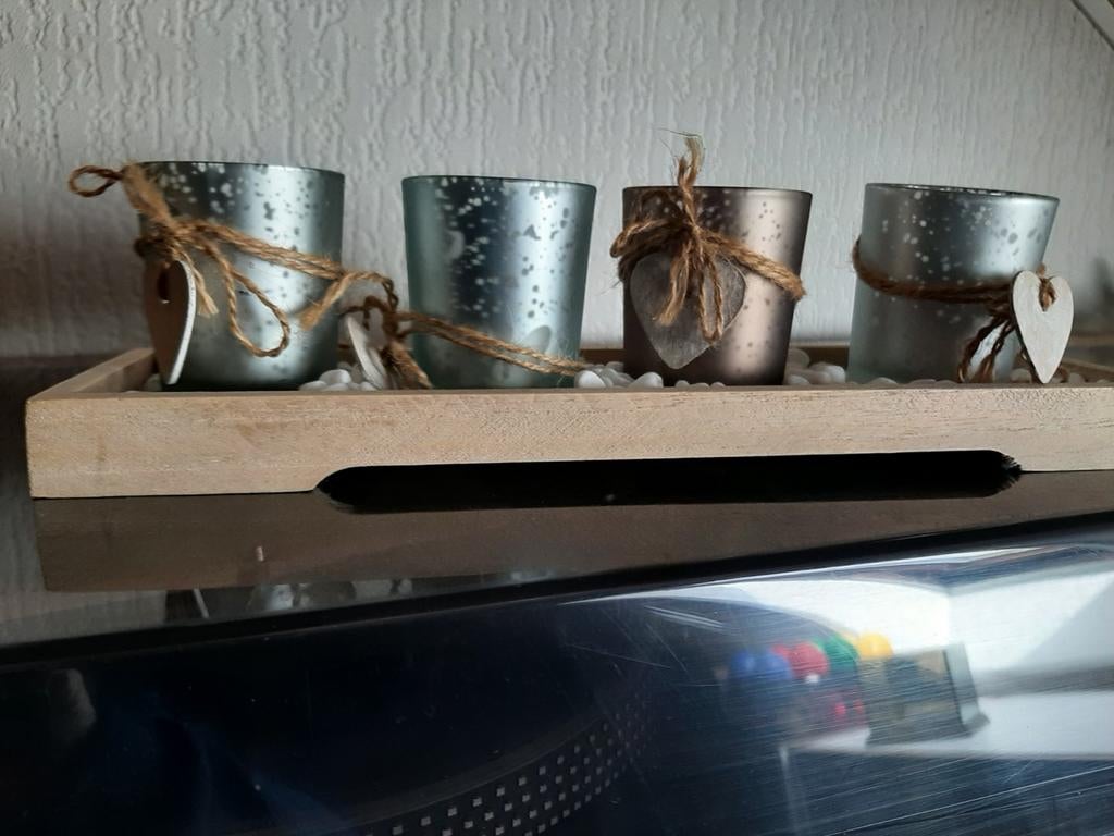 4 glaasjes met theelichtjes, Ophalen