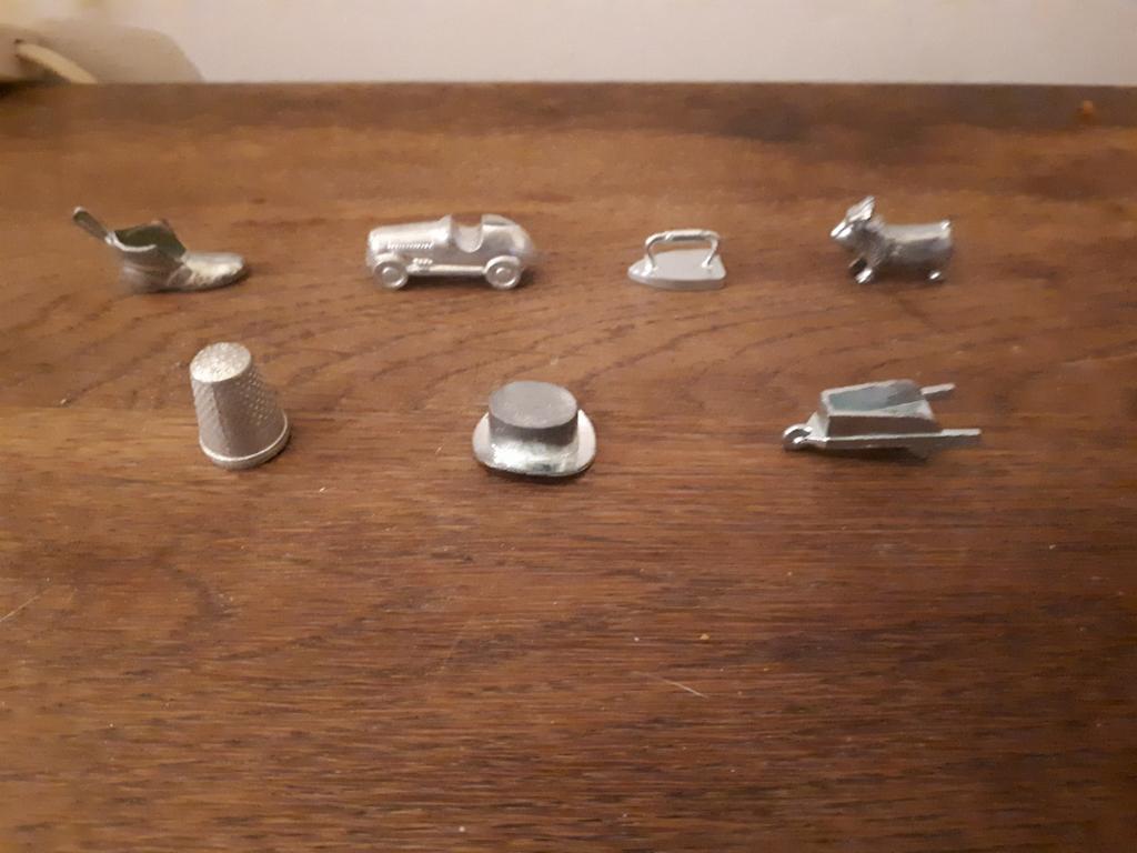 Set van 7 metalen monopoly pionnen, Hobby en Vrije tijd, Gezelschapsspellen | Bordspellen, Ophalen of Verzenden, Zo goed als nieuw
