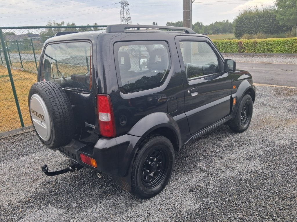 suzuki jimny #4x4# 1300cc benzine !!77 000km!! bj 2007, Auto's, 4 zetels, Stof, Zwart, Zwart