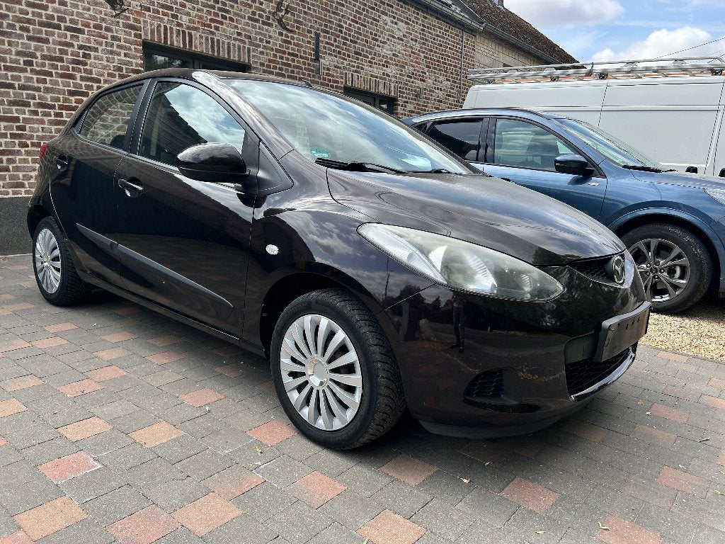 Mazda 2 1.3 i AIRCO/5 deuren/1 jaar garantie/1st Proper., https://public.car-pass.be/vhr/3ea31eeb-a99e-41f9-8b43-a139e4202ce5