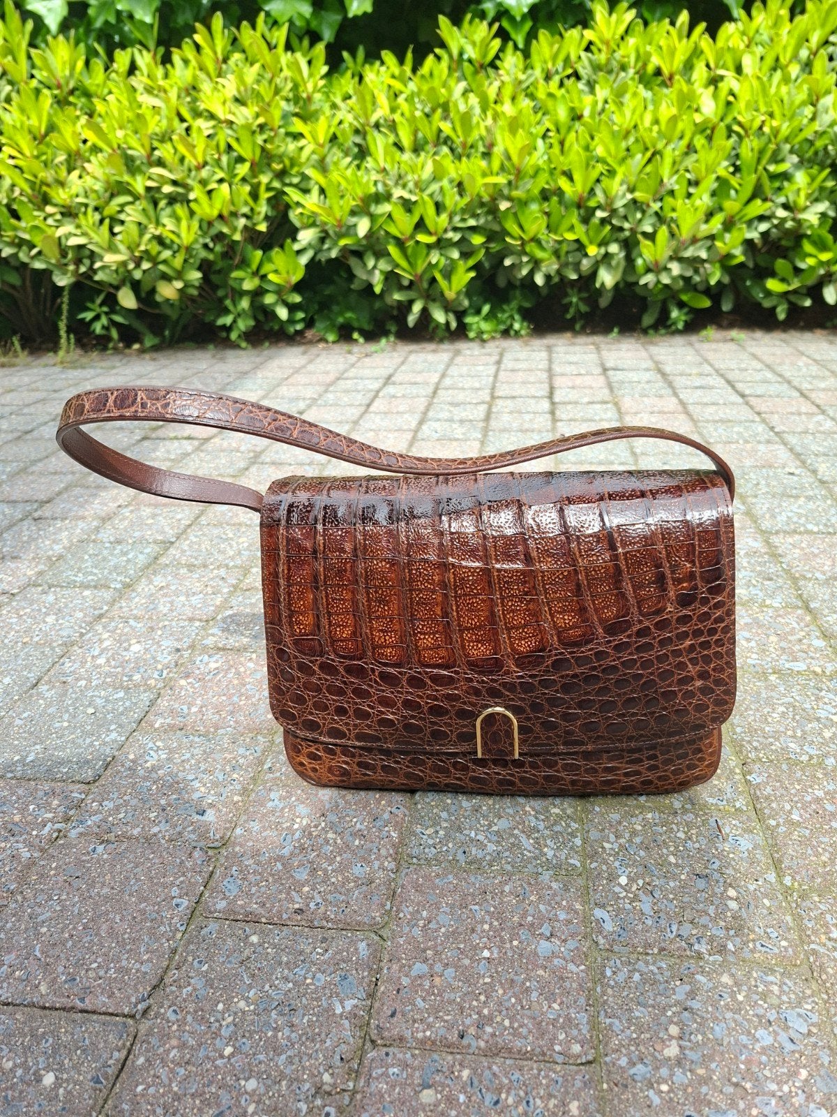 Vintage handtas, Ophalen