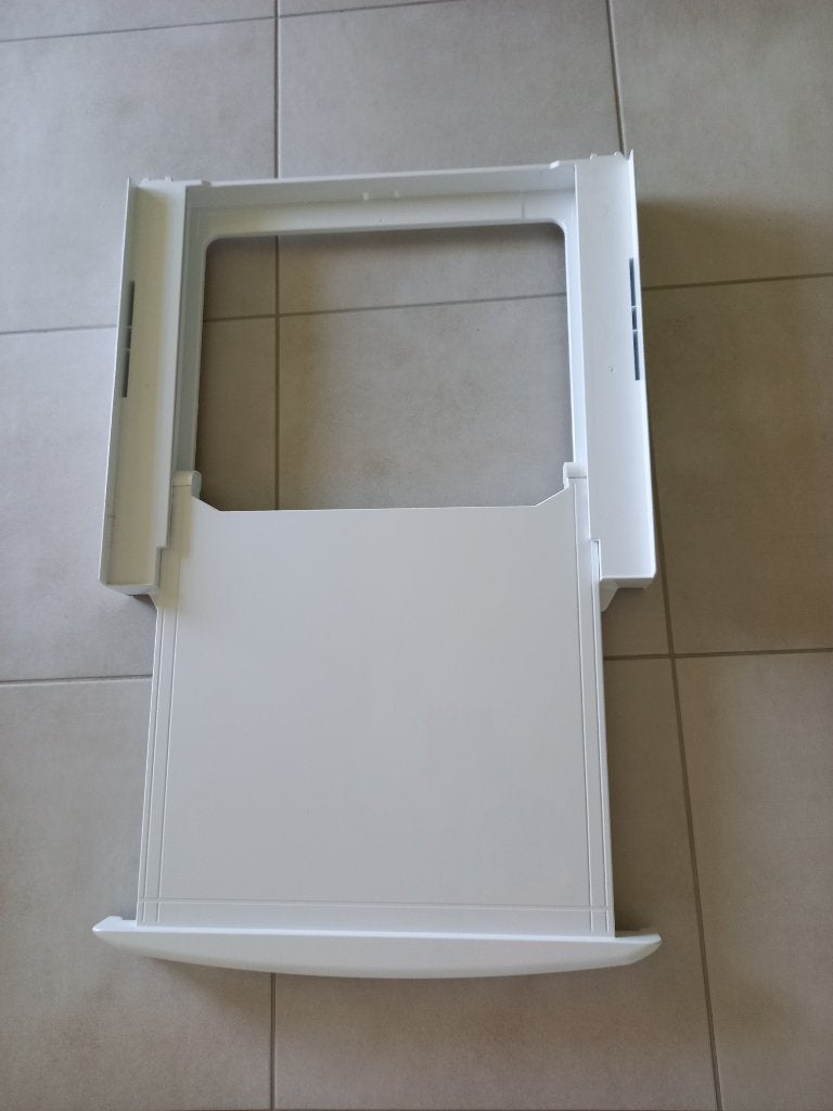 Tussenplaat met uitschuiflade wasmachine en droogkast, Ophalen