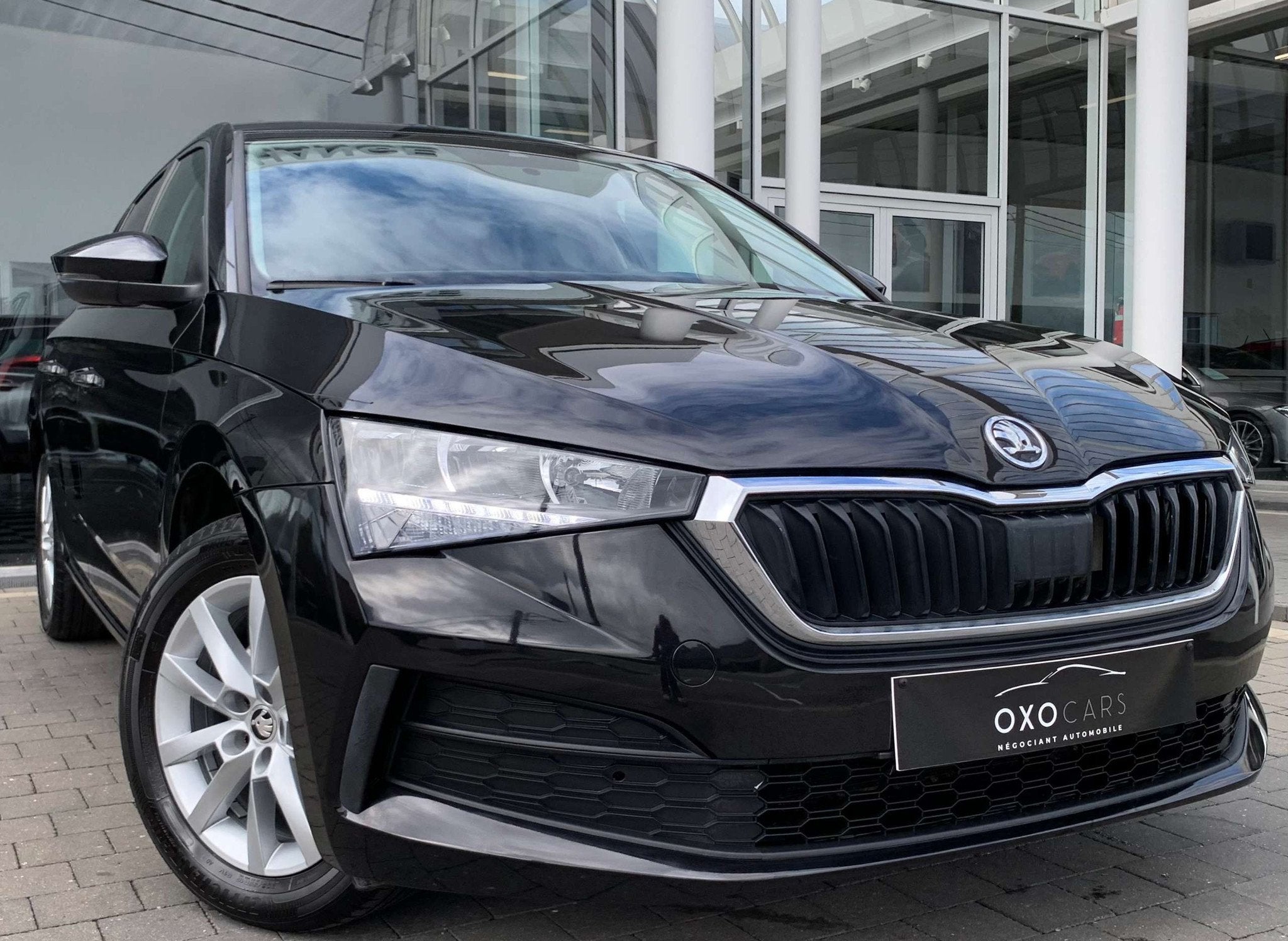 Skoda Scala 1.0TSI 116CV Essence / Airco / CarPlay / KeyLess, Entreprise, Noir, 5 portes, Tissu