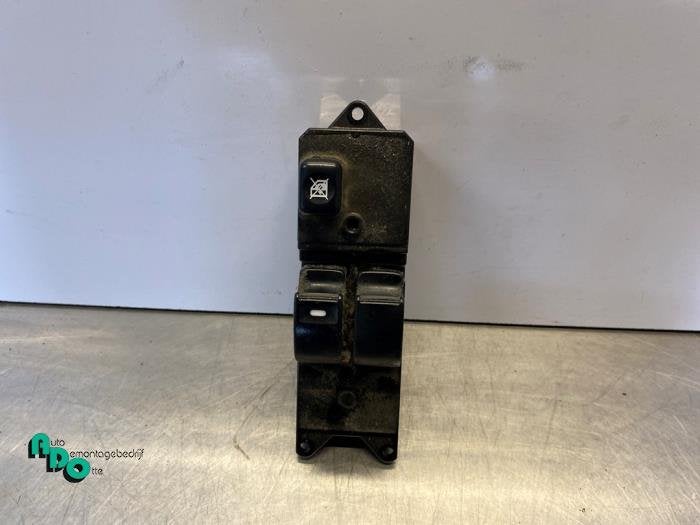 Commutateur vitre électrique d'un Mitsubishi Colt (Colt 04-, -, 3 mois de garantie, Utilisé, Mitsubishi