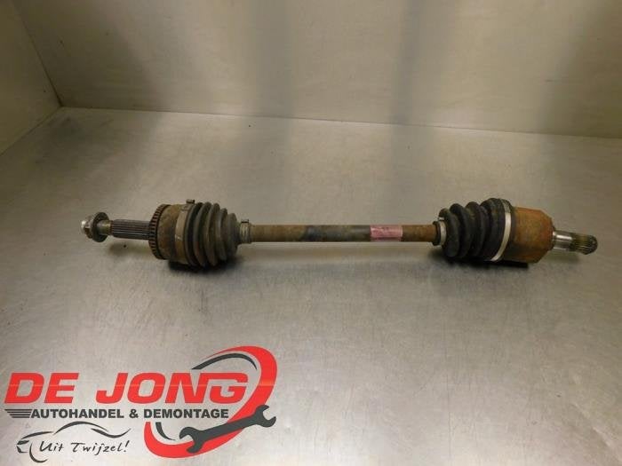 Arbre de transmission avant gauche d'un Kia Rio, Kia, -, 3 mois de garantie, Utilisé