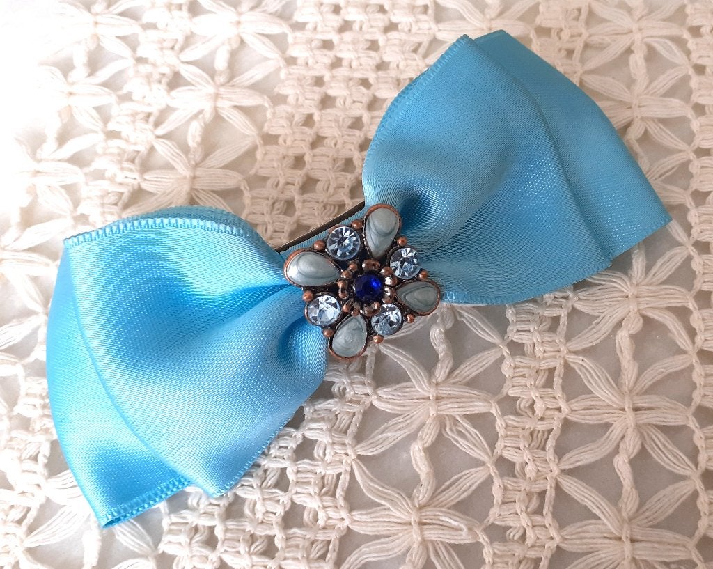 haarspeld vintage strik blauw met diamantjes, Enlèvement ou Envoi, Neuf, Épingle à cheveux