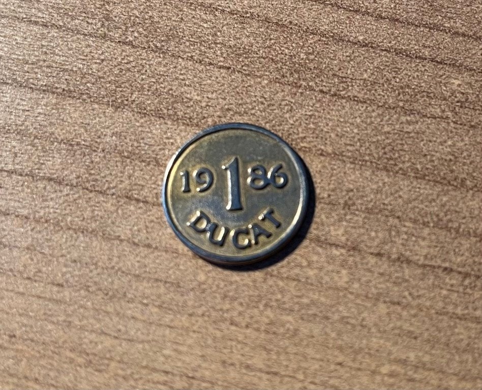 Jeton - 1 Ducat - 1986 - insigne publicitaire, Enlèvement ou Envoi