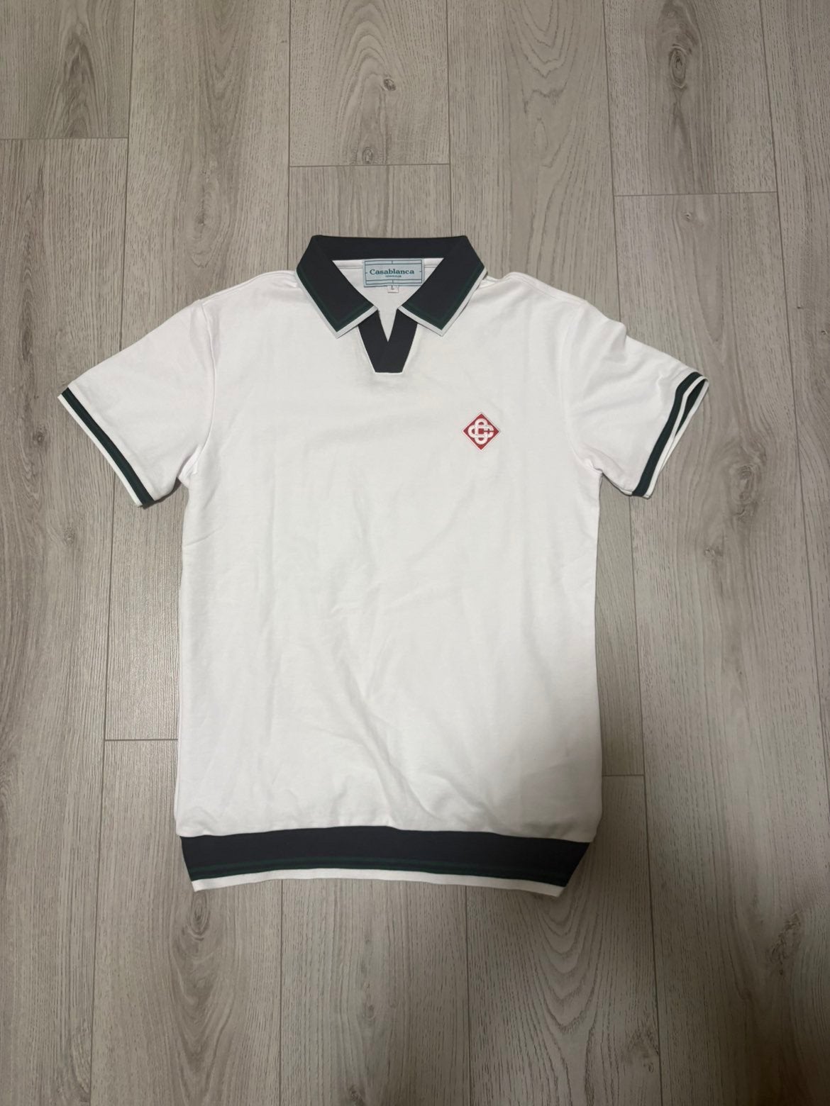 Polo Casablanca, Enlèvement, Comme neuf, Taille 52/54 (L)