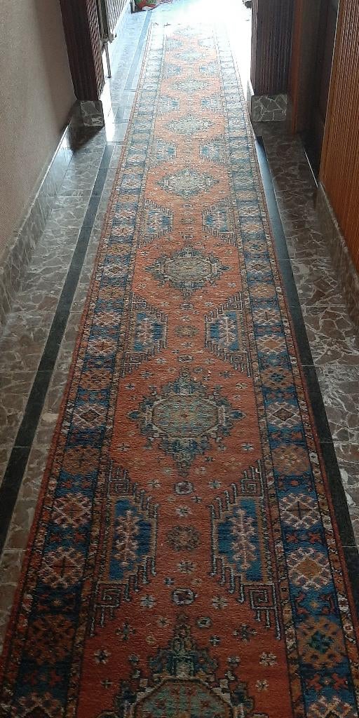 Tapis ancien 6 m, Enlèvement