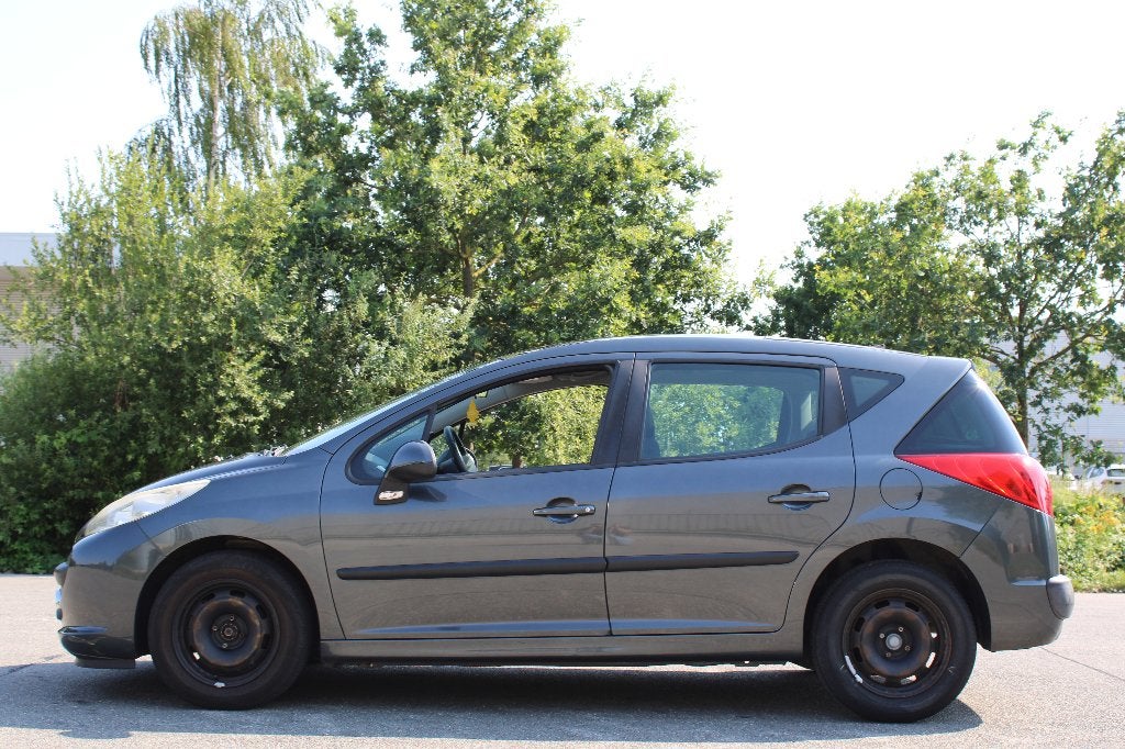 Peugeot 207 SW 1.4i 16v Trendy, Auto's, Stof, 140 g/km, Zwart, 4 cilinders