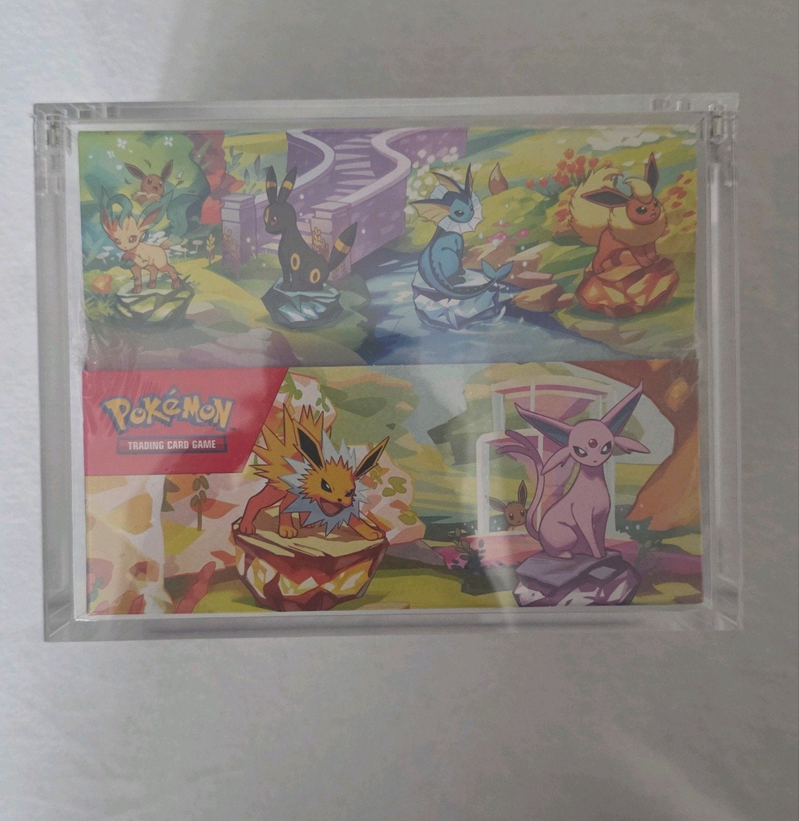 Pokémon prismatic evolutions tin display pokemon, Ophalen