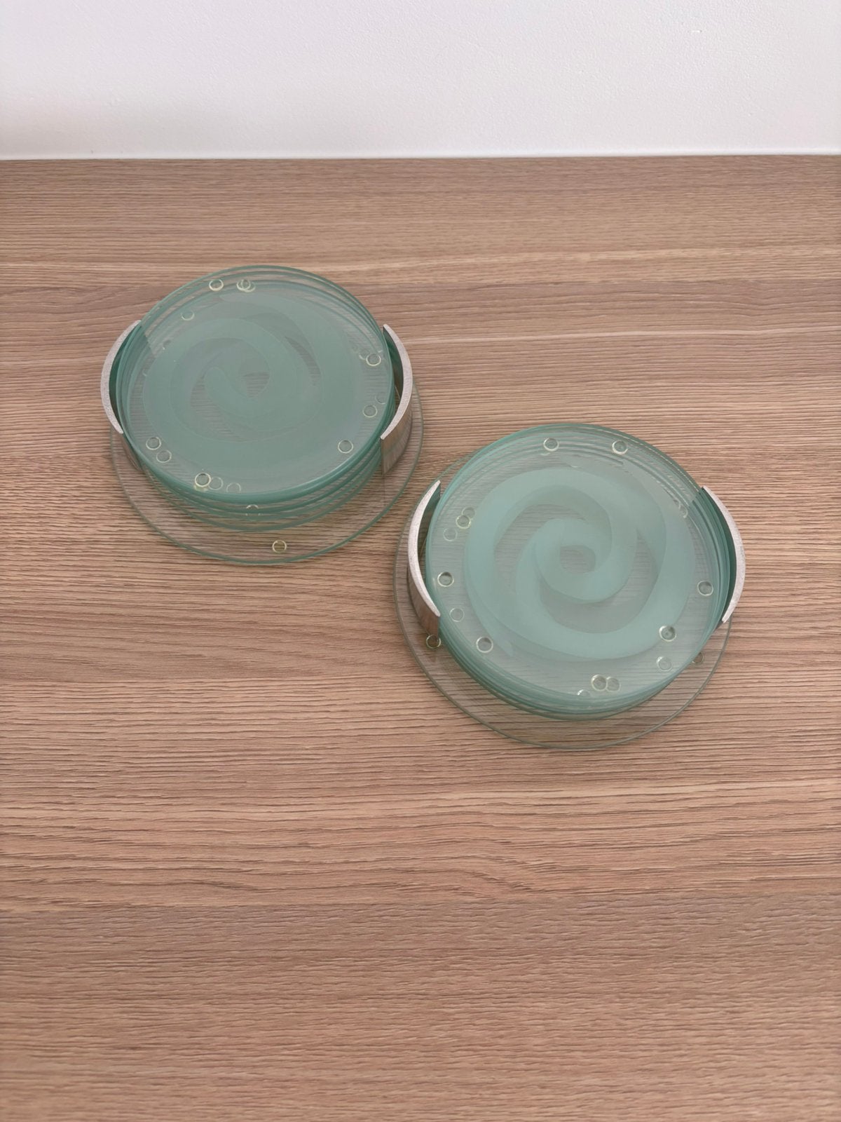 2 sets glazen onderzetters, Ophalen