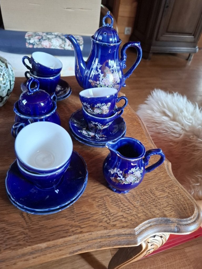 Cobalt-blauw porseleinen servies, Ophalen