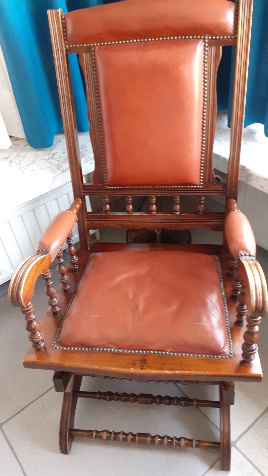 antieke schommelstoel, Ophalen