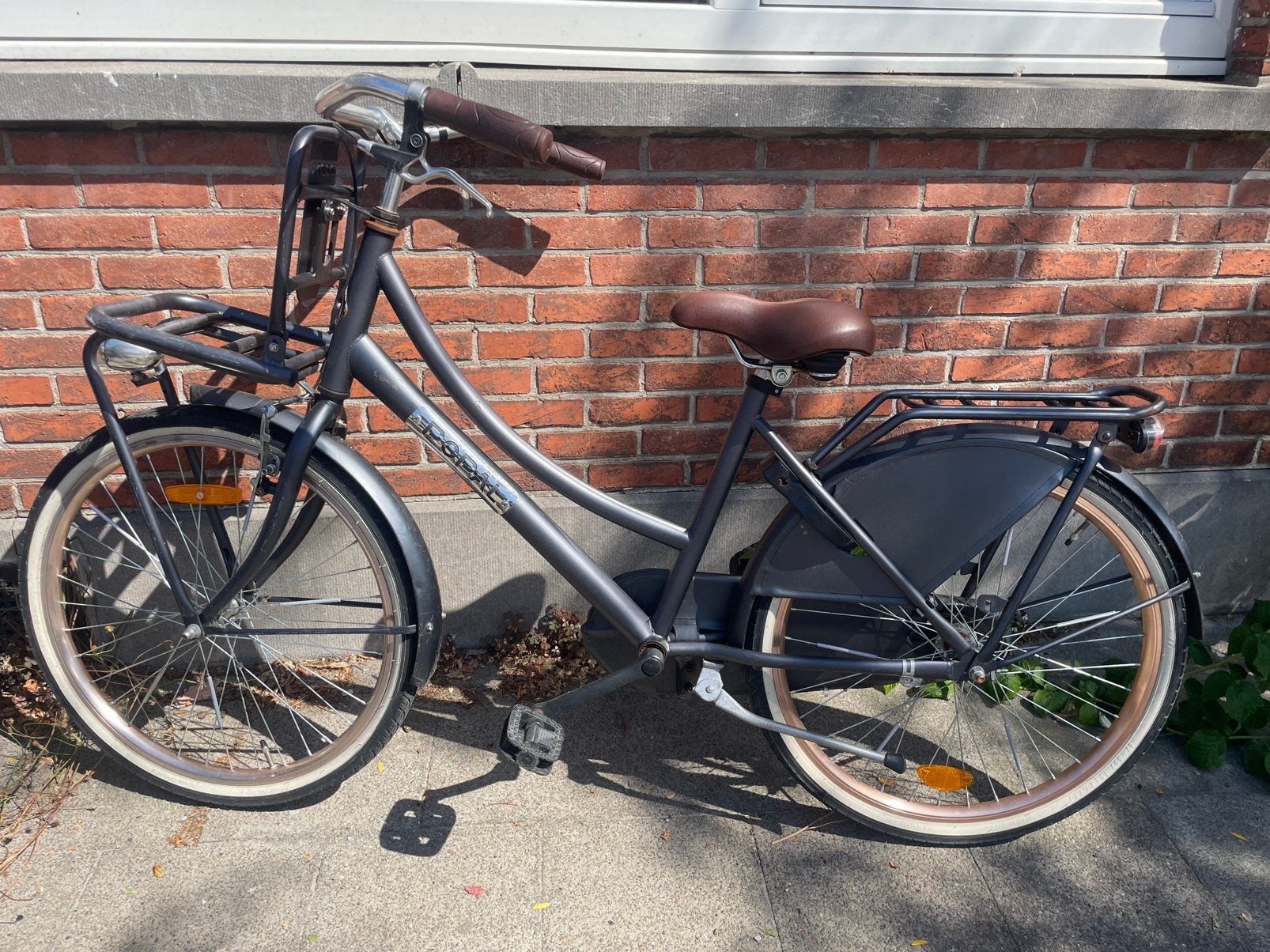Kinderfiets zwart met beugelslot - 24 inch wielen, Ophalen, Gebruikt, Terugtraprem