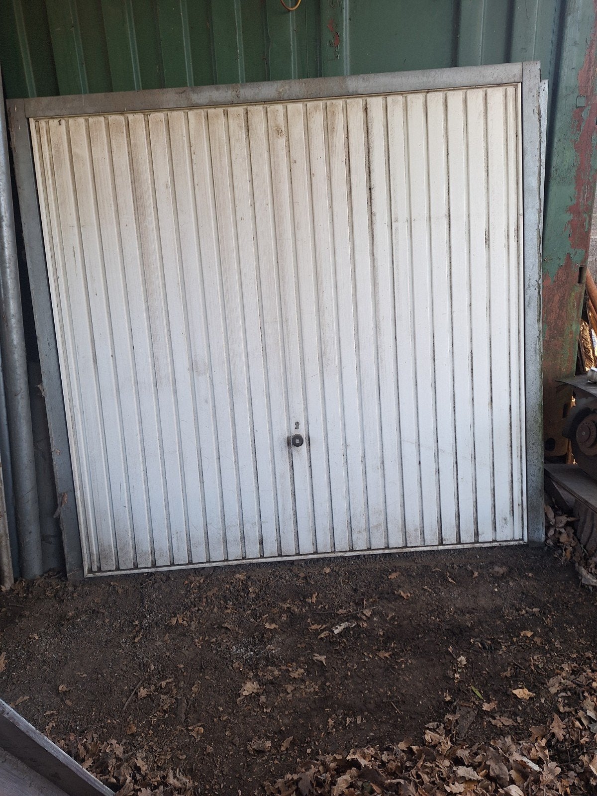 garage poorten in omlijsting, Ophalen