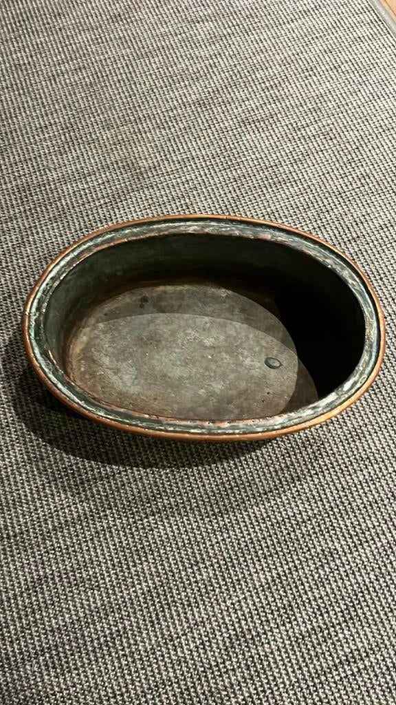 Pot en cuivre, Ophalen