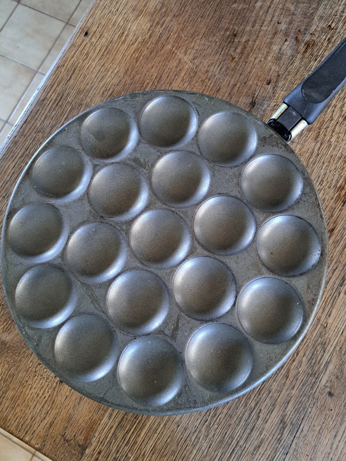 Poffertjes pan, Ophalen