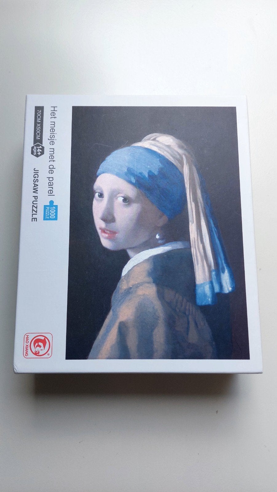 Puzzel: het meisje met de parel, Hobby en Vrije tijd, Ophalen of Verzenden, 500 t/m 1500 stukjes, Nieuw, Legpuzzel