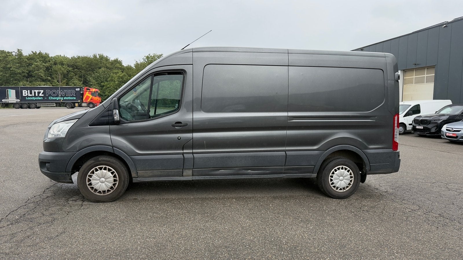 Ford Transit 2.2 TDCi L2H2 AWD LICHTE VRACHT EXPORT, Stof, 4 cilinders, Zwart, Bedrijf