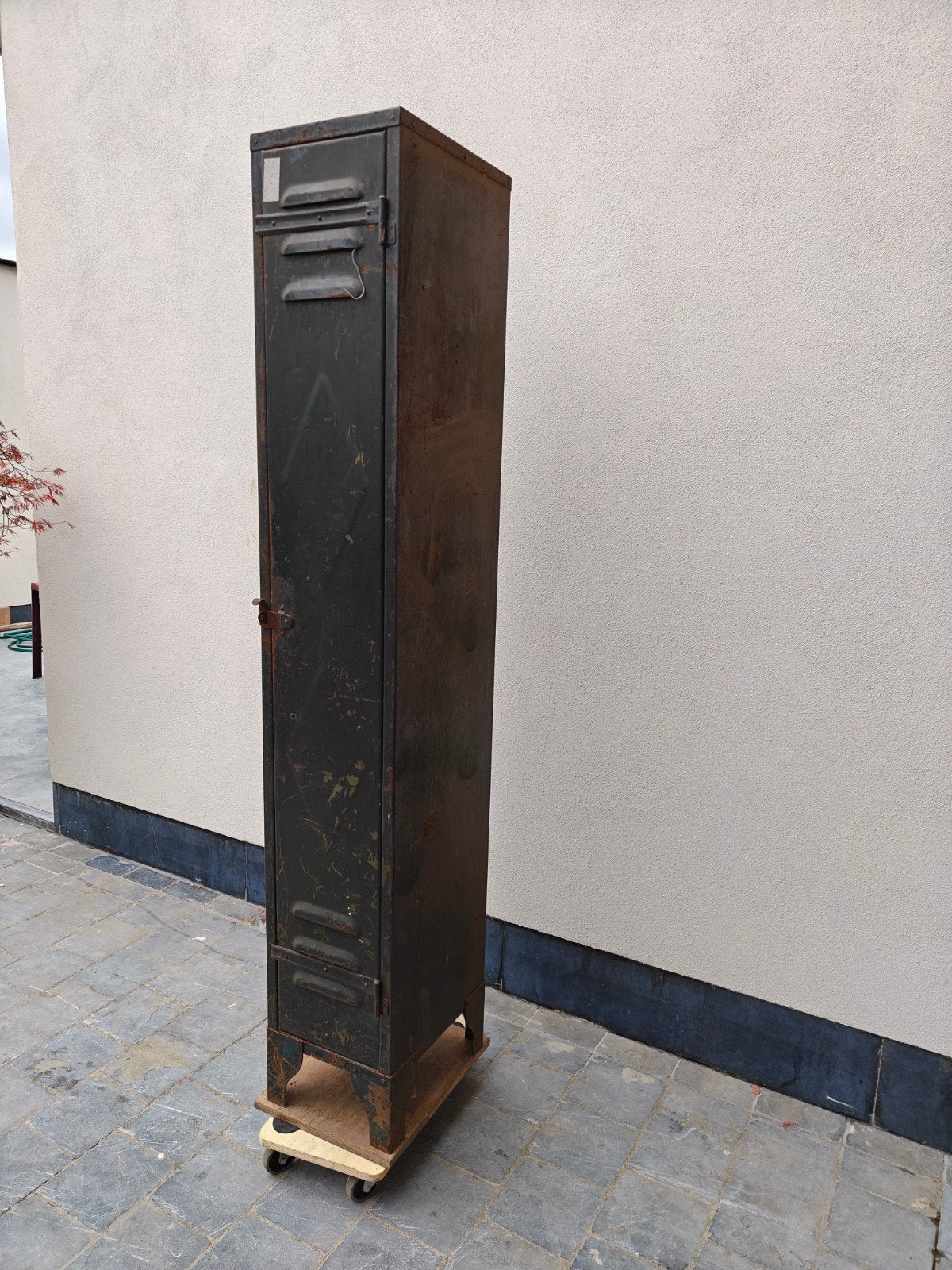 Groene locker kast 1950, Ophalen