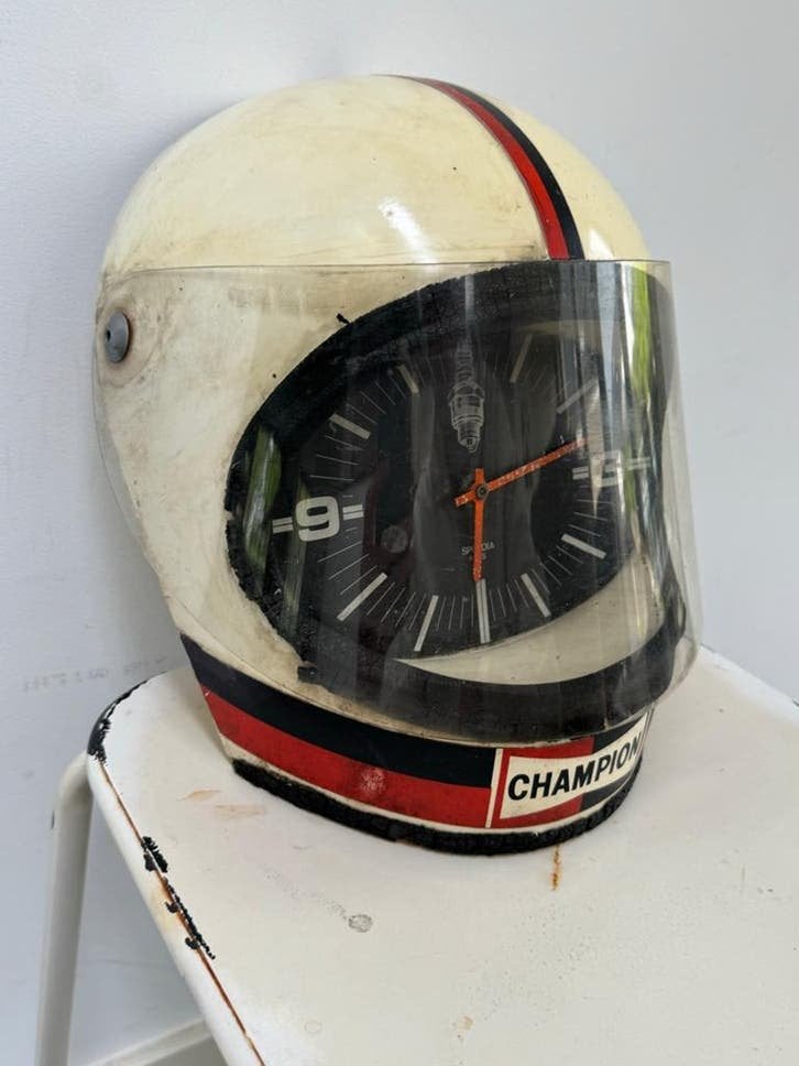 Vintage Champion Motorhelm reclame Klok