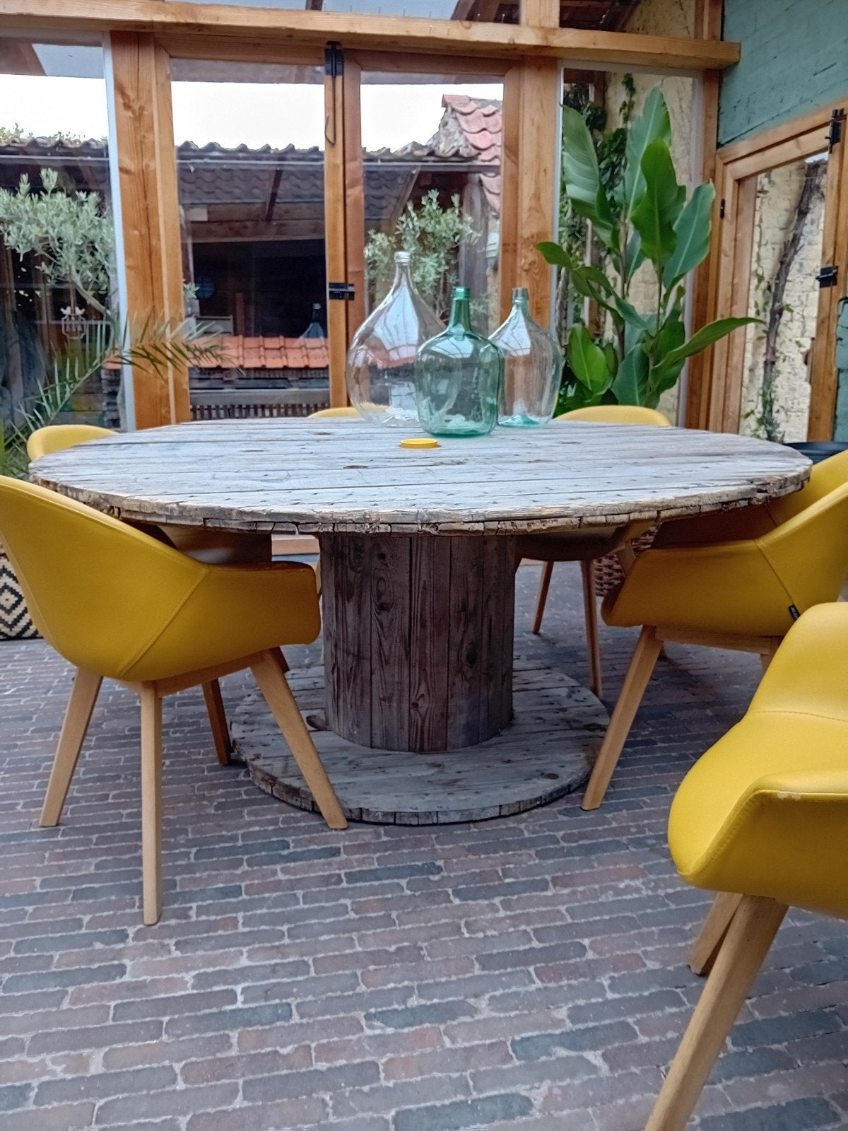 grote ronde zelfgemaakte tafel van oude bobijn te koop., Huis en Inrichting, Tafels | Eettafels, Ophalen, Rond, Vijf personen of meer