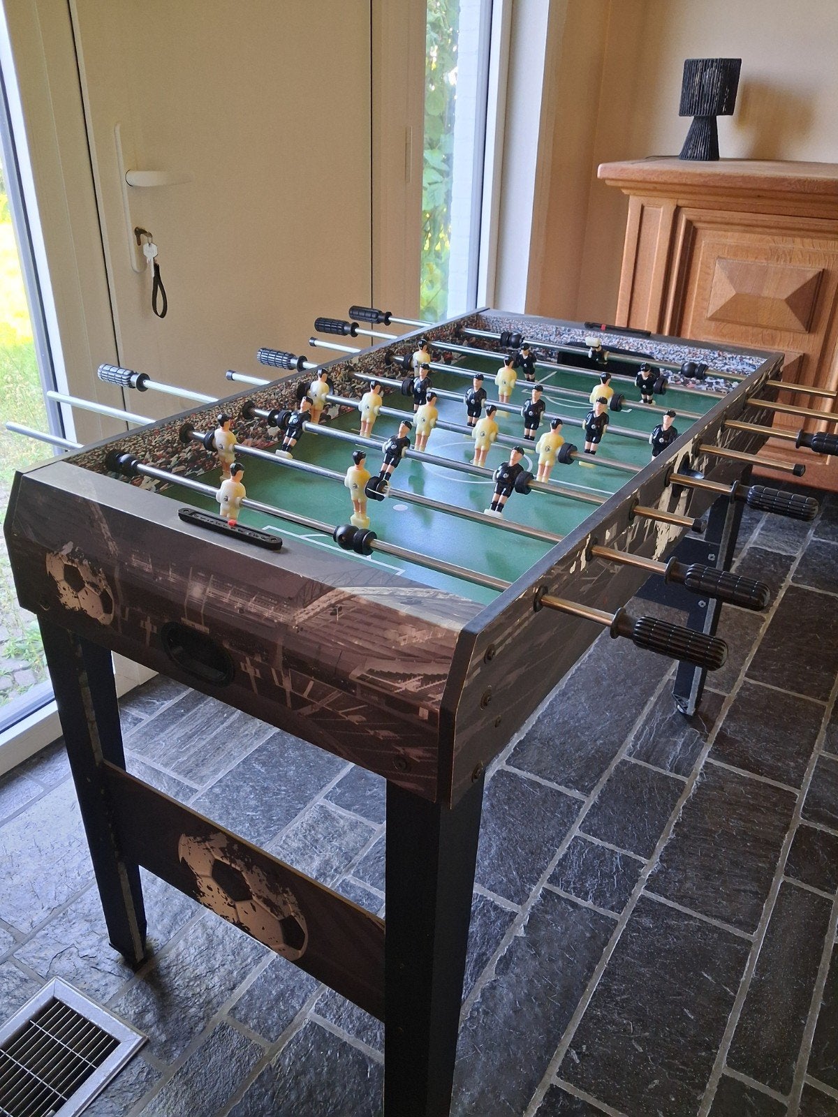 Kickertafel, Ophalen