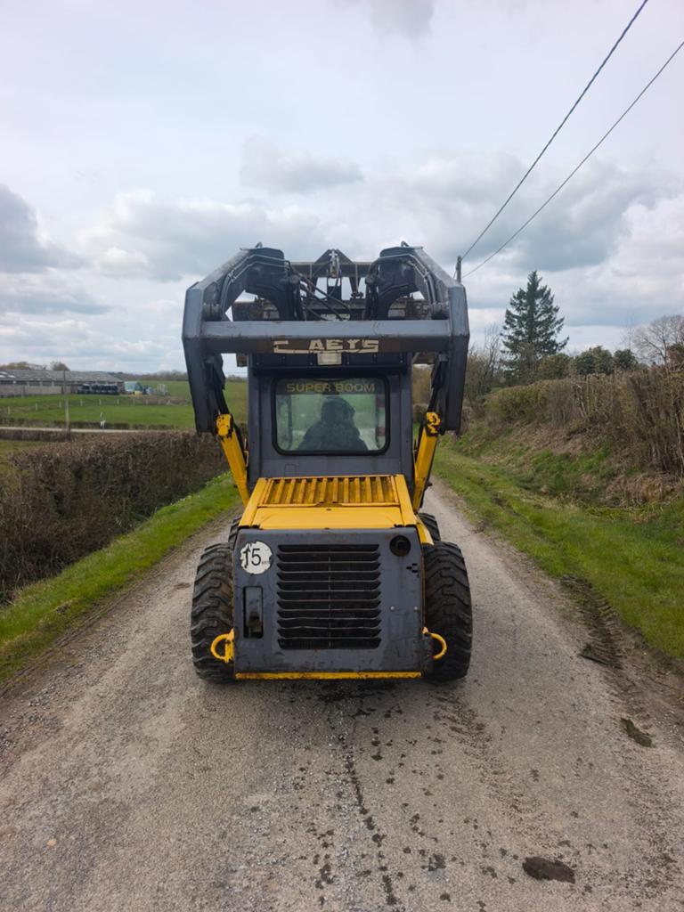New Holland Bobcat met mestklem, Enlèvement