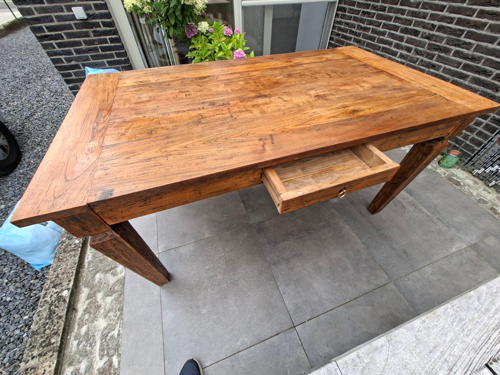Teak eettafel, Ophalen