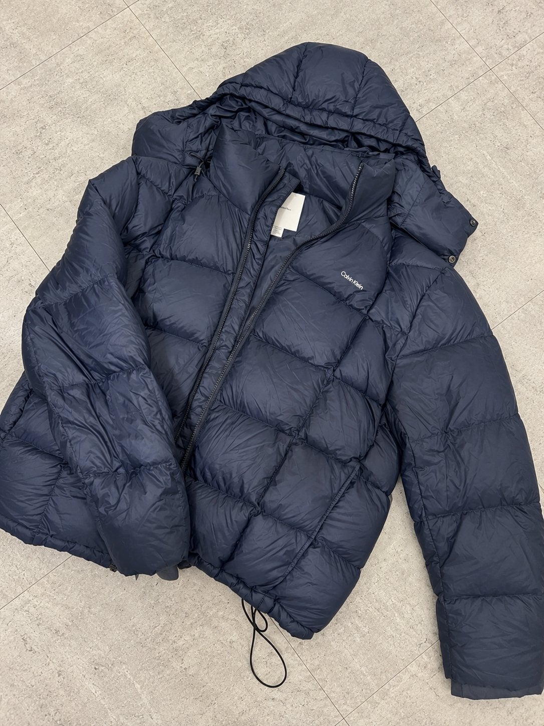 Nieuwe Calvin klein puffer jas (Nieuwprijs €300), Ophalen of Verzenden, Zo goed als nieuw, Maat 56/58 (XL), Blauw