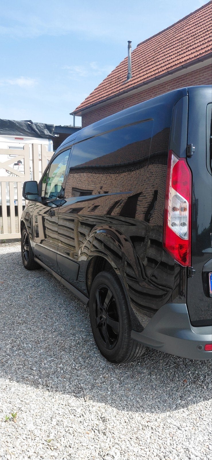 Ford transit courier benzine,airco,trekh..., Auto's, Bestelwagens en Lichte vracht, Voorwielaandrijving, Euro 5, Stof, Zwart
