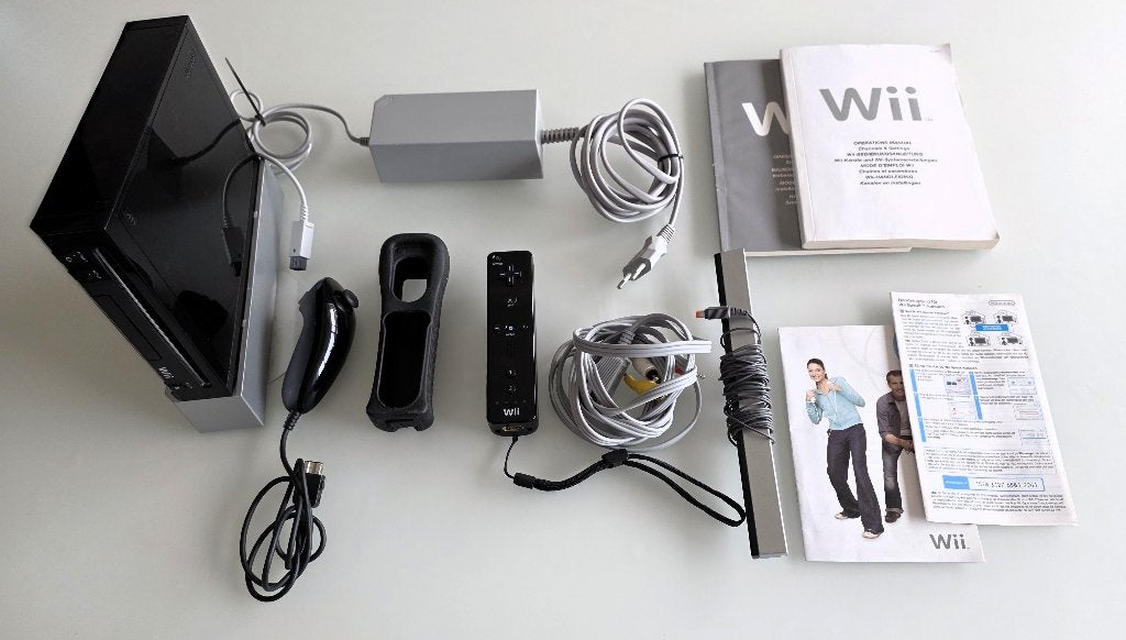 2 Nintendo Wii consoles met bijhorende kabels, Games en Spelcomputers, Ophalen of Verzenden