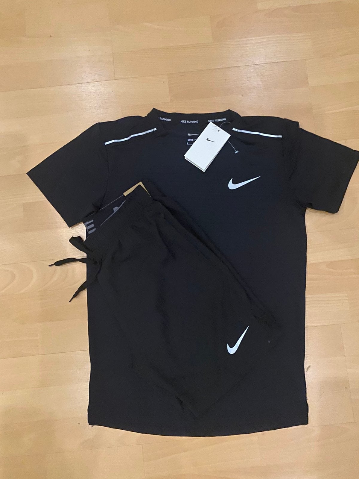 Nike miler, Ophalen of Verzenden, Nieuw, Maat 48/50 (M), Zwart