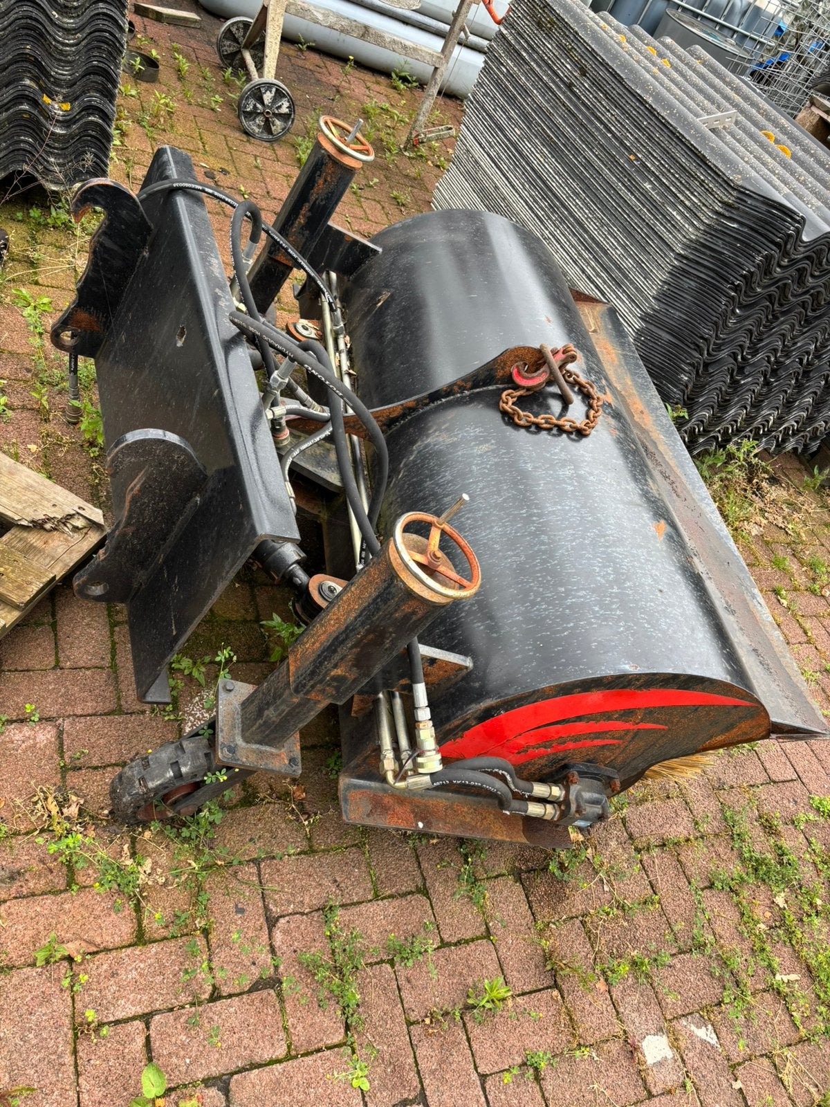 Rolbezem veegmachine minishovel veger, Enlèvement