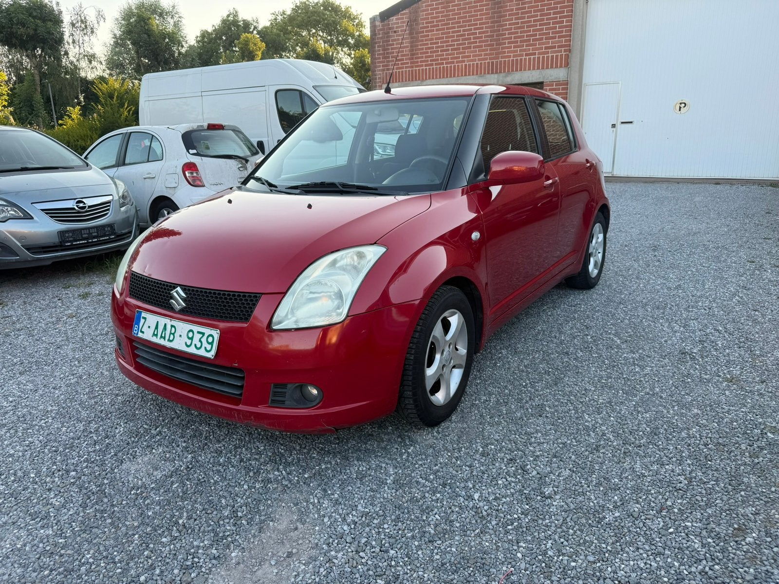 Suzuki Swift 1.3GLX AIRCO, Autos, Suzuki, Rouge, Boîte manuelle, Tissu, Euro 4