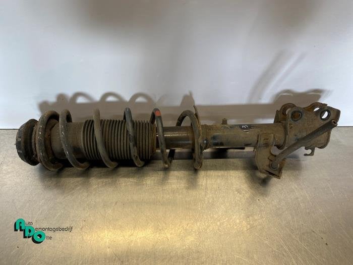 Schokdemperpoot links-voor van een Nissan Note (Note 13-), Gebruikt, -, -, Ophalen of Verzenden