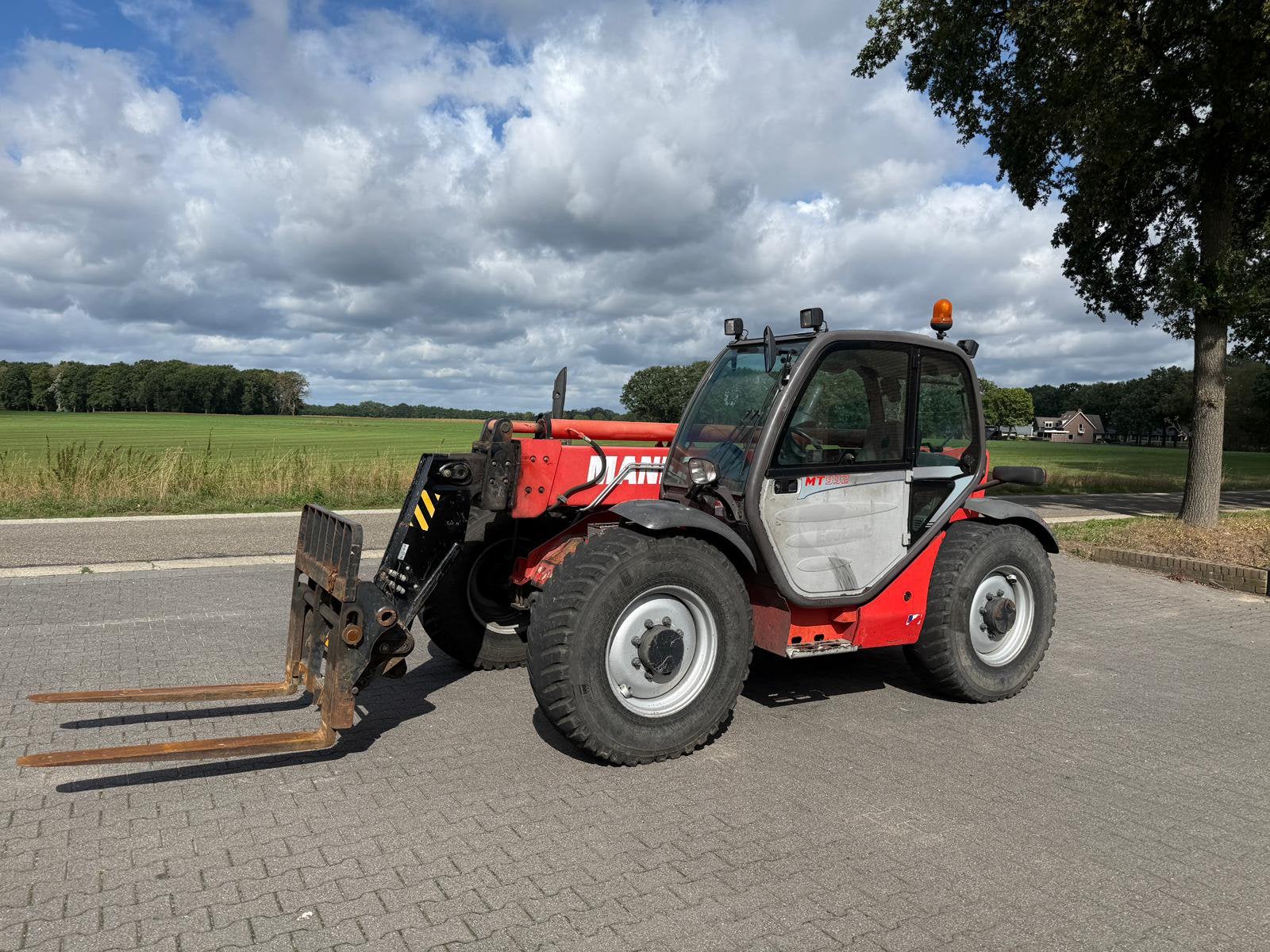 Manitou MT932 verreiker  (bj 2009), Ophalen