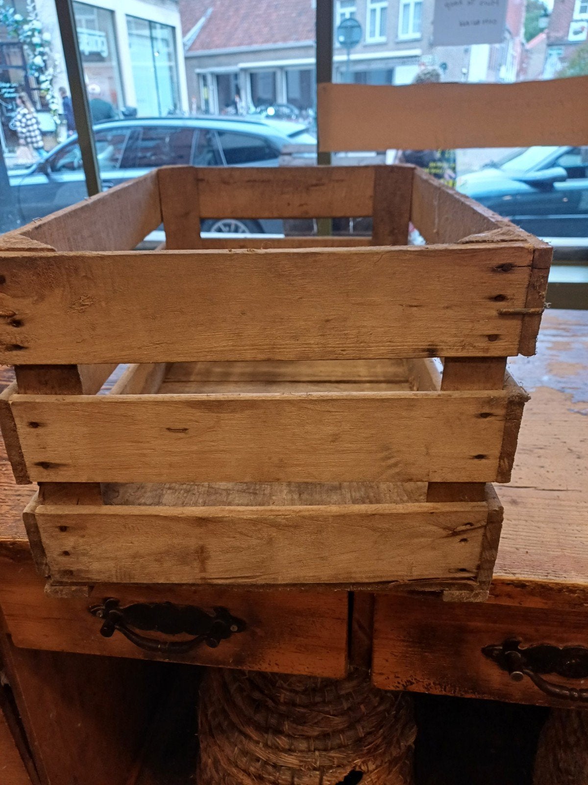 oude fruitkisten, Enlèvement