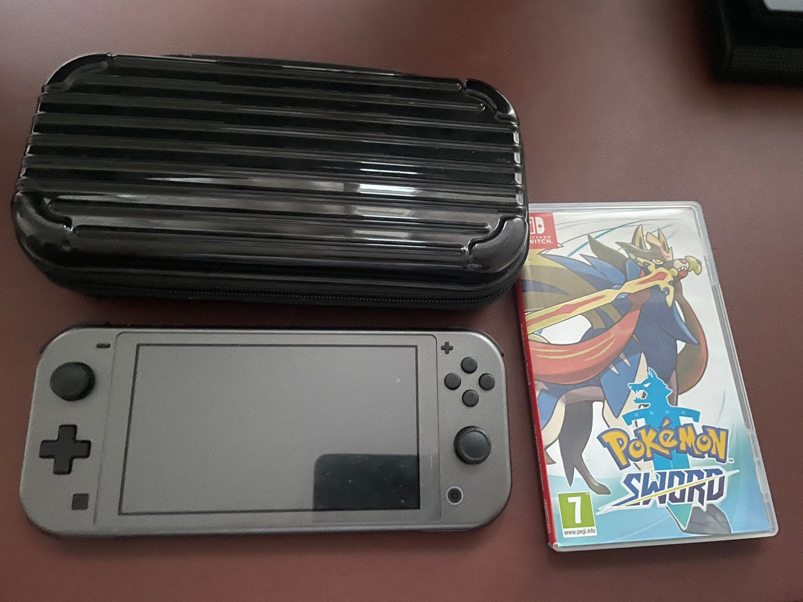 Nintendo Switch Lite Palkia Edition + Pokémon Sword, Ophalen, Gebruikt, Met games