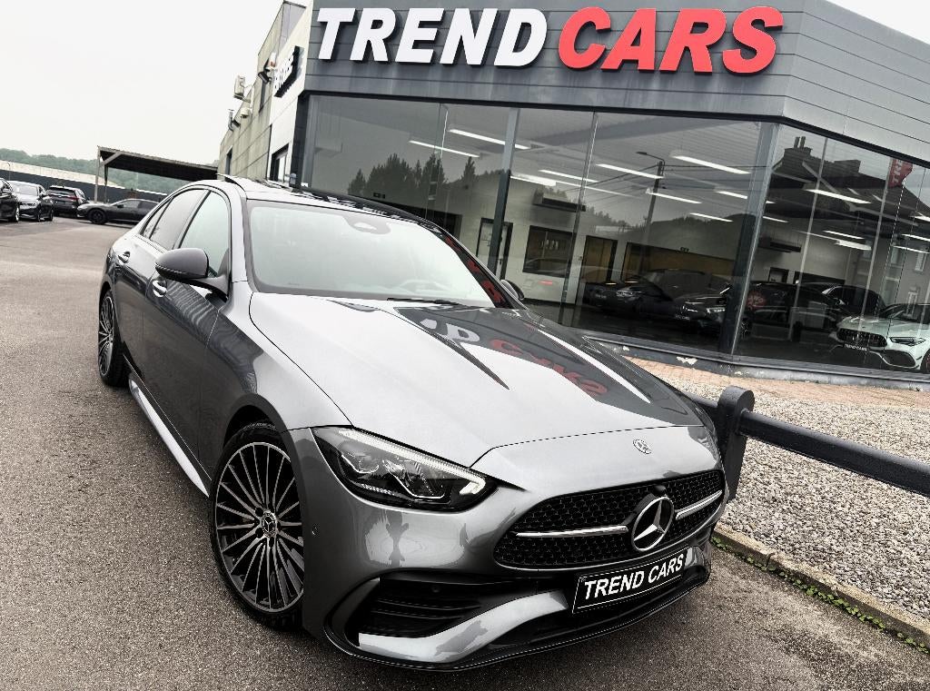 Mercedes C 180 9G-TRONIC PACK AMG/NIGHT PANO CRPLAY LED AMBI, Automaat, Zwart, 4 cilinders, Leder