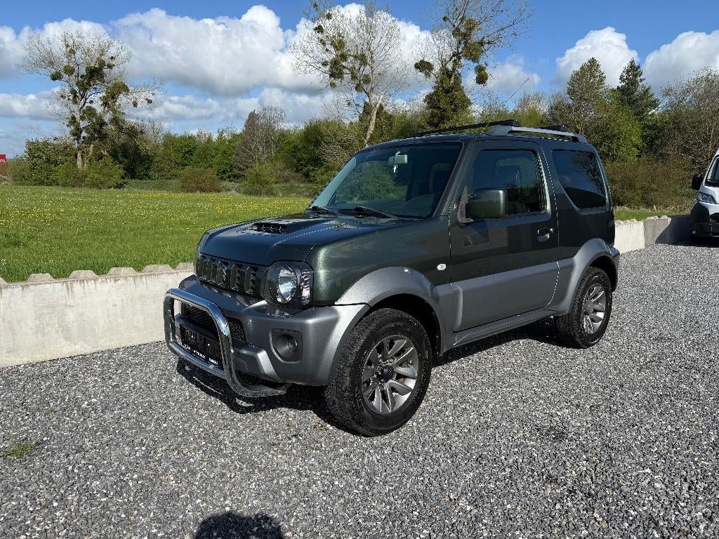 Suzuki Jimny 1.3 85CH DAKOTA **Cuir 4X4 Clim Attelage**, Auto's, Suzuki, 1328 cc, Handgeschakeld, Vierwielaandrijving, 4x4