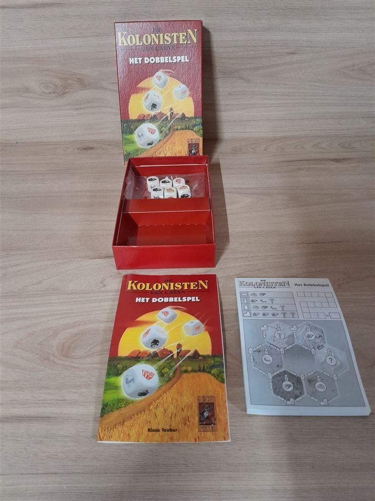 De kolonisten van Catan - het dobbelspel - s3513, Hobby en Vrije tijd, Gezelschapsspellen | Bordspellen, Verzenden, Zo goed als nieuw