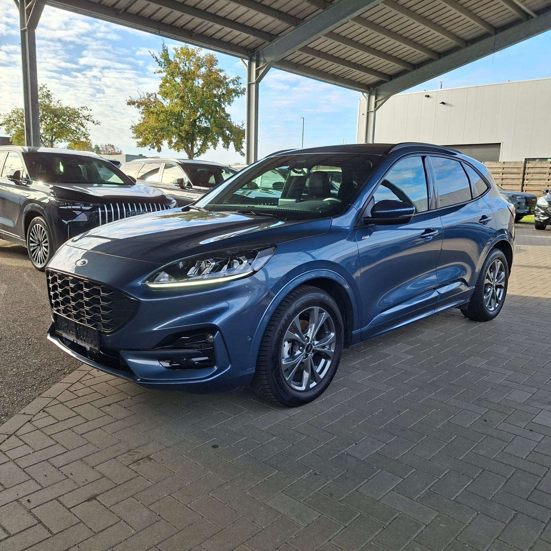 Ford Kuga St - Line 2.5i FHEv / winterpack / Elek trekhaak, Auto's, Automaat, Stof, Gebruikt, Blauw