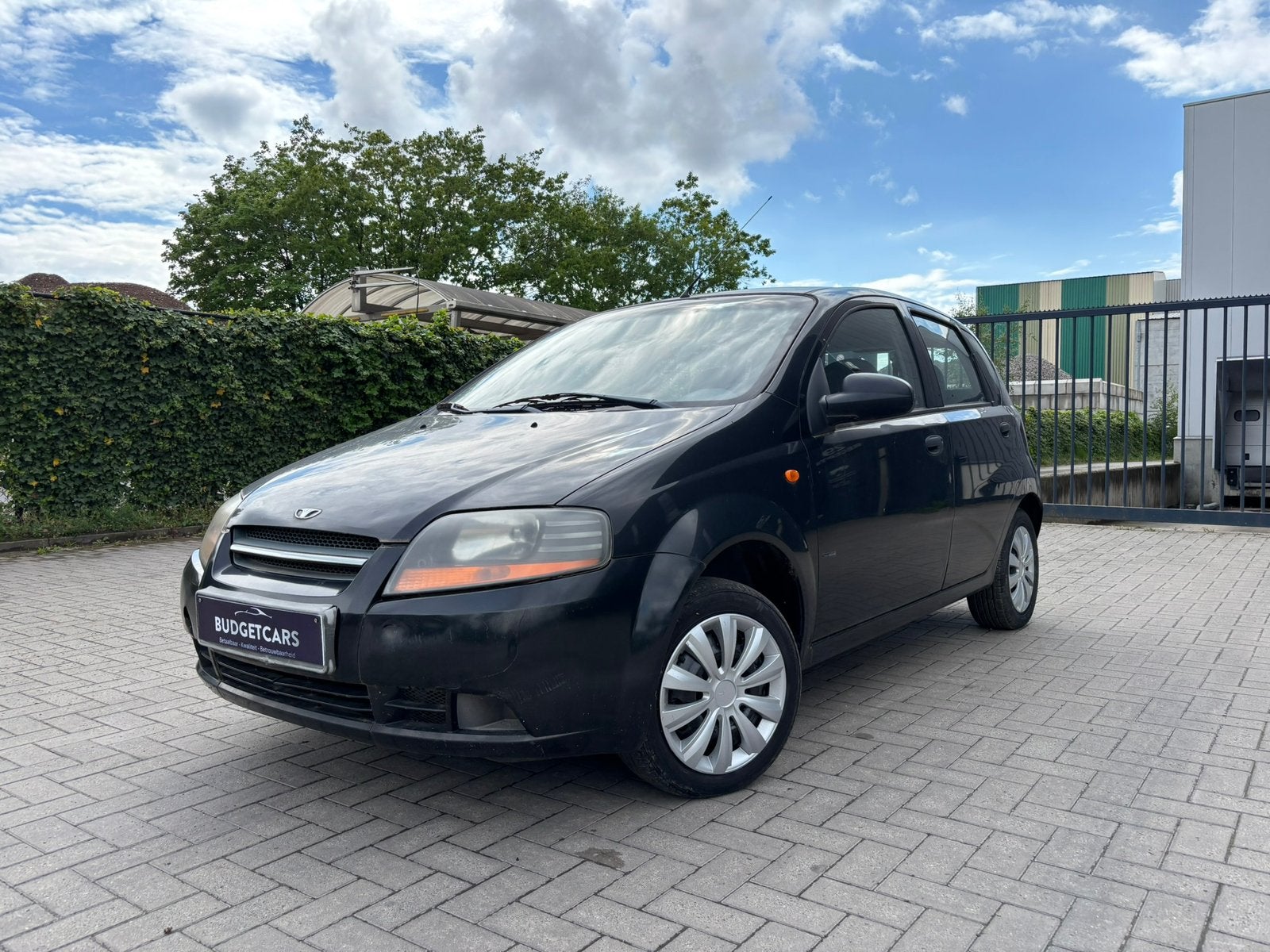 Daewoo Kalos 1.2iBenzine/2006/Airco/Proper!/Gekeurd* 1.499€, Auto's, Daewoo, Stof, Kalos, Zwart, Bedrijf