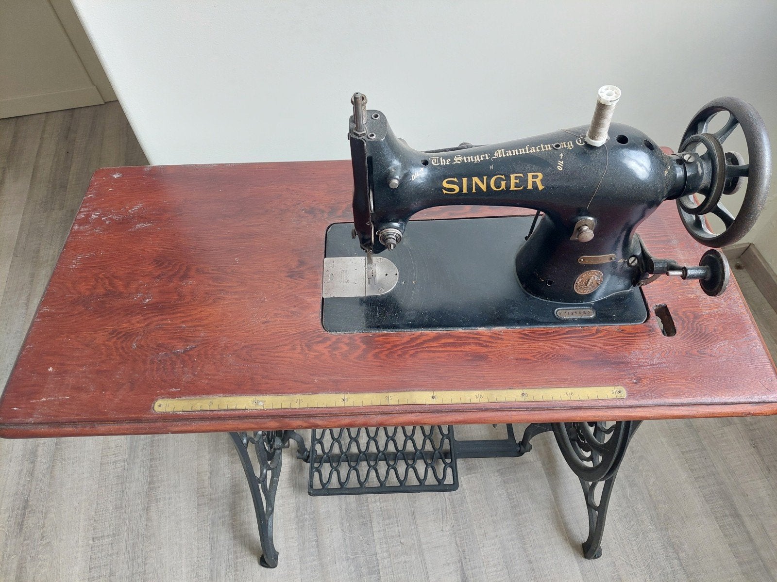 Machine à coudre Singer ancienne, Ophalen