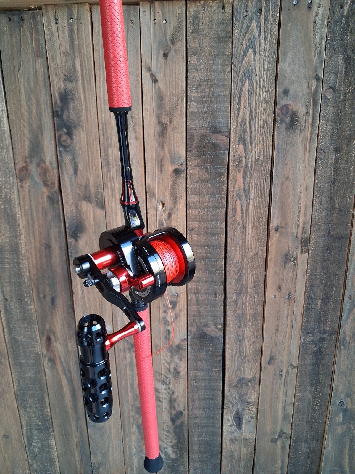 Verticaal hengel + reel meerval unicat, Ophalen