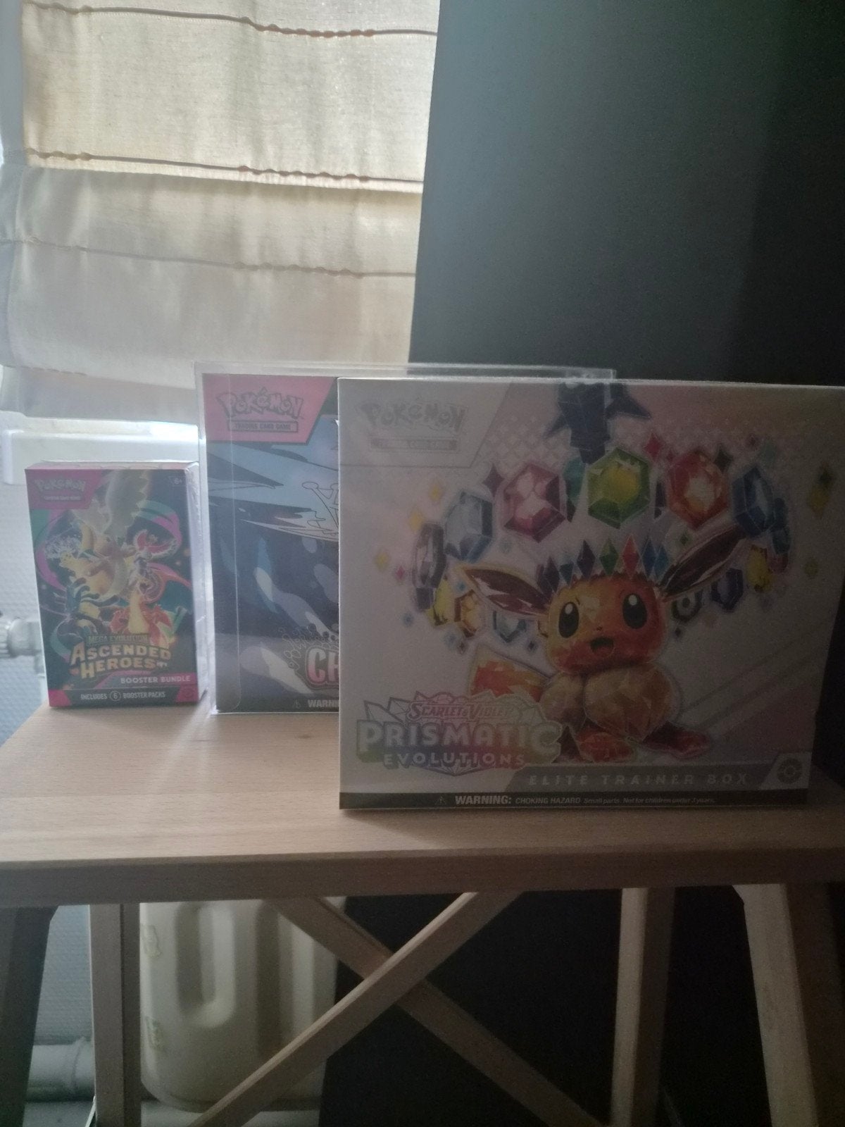 Pokemon etb's (prismatic+chaos)   +boosterbundle ascended, Ophalen