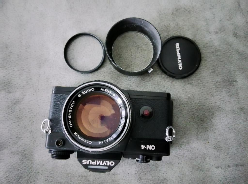 Olympus OM4 met OM Zuiko 50mm 1:1.4 lens, zonnekap,UV filter, Audio, Tv en Foto, Fotocamera's Analoog, Ophalen of Verzenden, Zo goed als nieuw